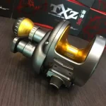Fabrieksprijs XZOGA * TXZ REEL TX-S 31PG - LEFT - gunsmoke